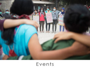 women protesters in a circle