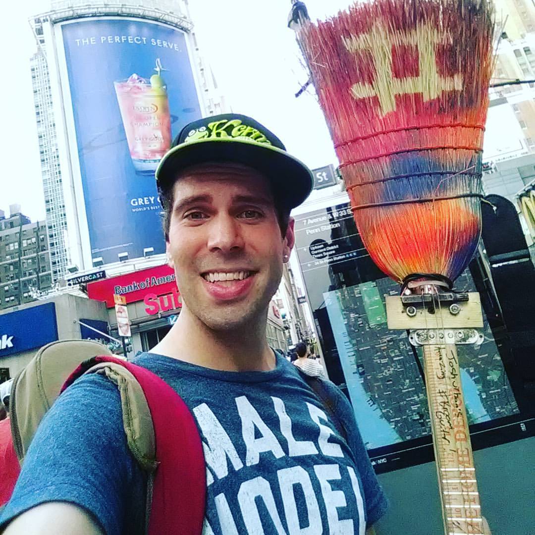 playing_broom_guitar