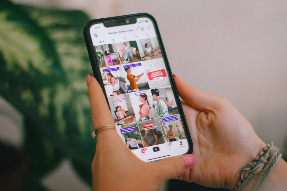 A coach takes a look at her Instagram account on mobile to get insight into what content themes are worth pursuing.
